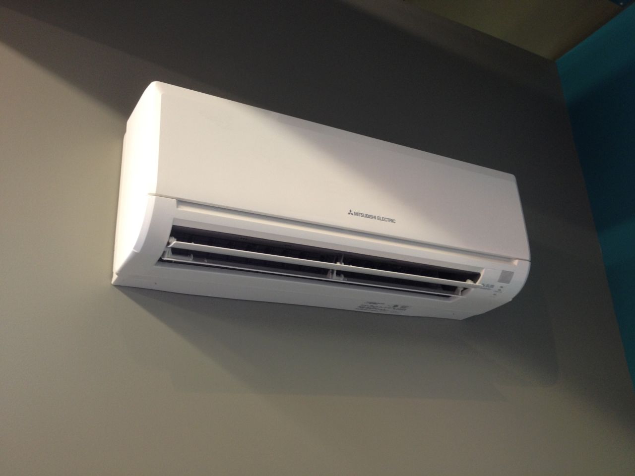 Mitsubishi indoor unit installed on wall in home in Queens, NY